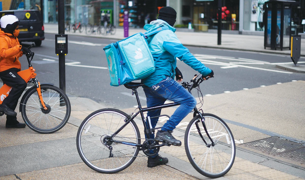Deliveroo is bracing for strikes by riders as it gears up for its IPO. (AFP)