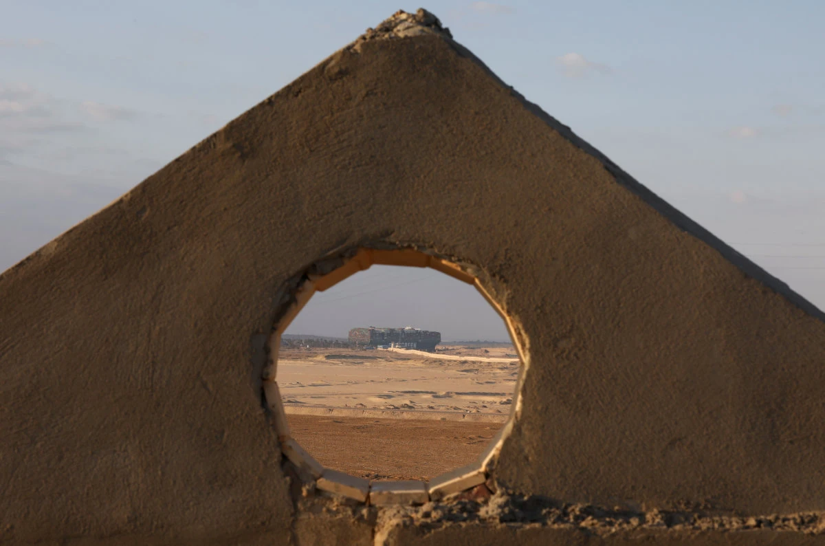 High tide raises hopes of freeing megaship blocking Suez Canal