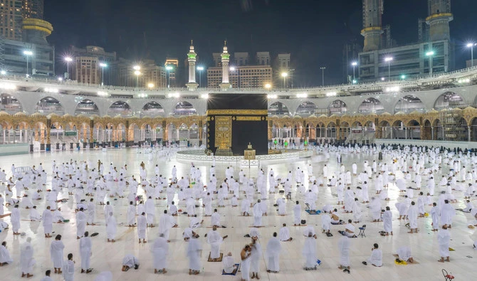 Muslims, keeping a safe social distance, perform Umrah at the Grand Mosque after Saudi authorities ease the coronavirus disease (COVID-19) restrictions, in Makkah on November 1, 2020. (SPA)
