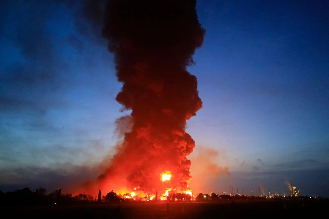 A massive fire rages at the Balongan refinery, operated by state oil company Pertamina, in Indramayu, West Java, on March 29, 2021. (AFP)