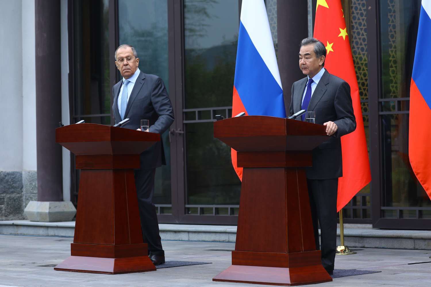Russia's FM Sergei Lavrov and China's FM Wang Yi attend a news conference following a meeting in Guilin, China March 23, 2021. (Reuters)