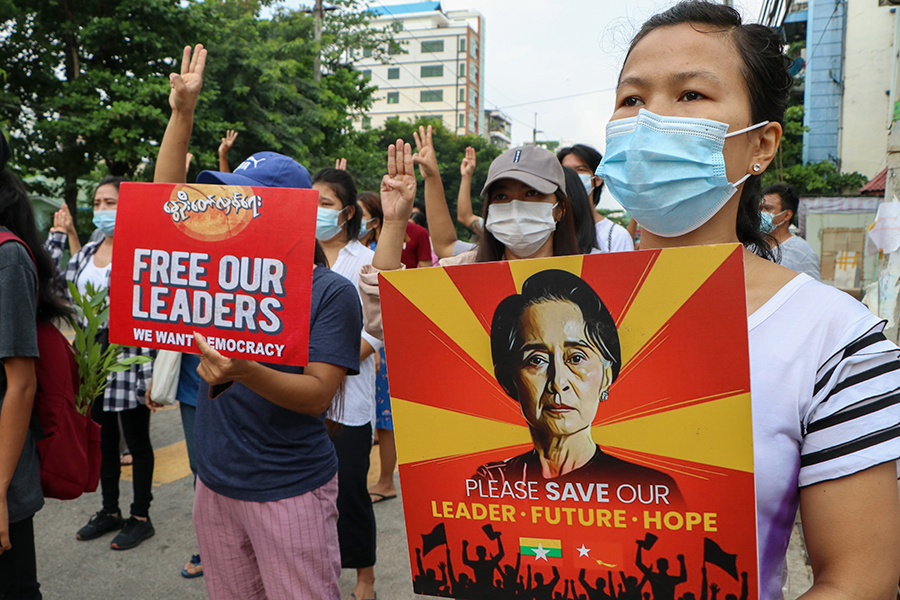 Anti-coup protesters march along a street in Yangon, Myanmar on April 24, 2021. (AP)