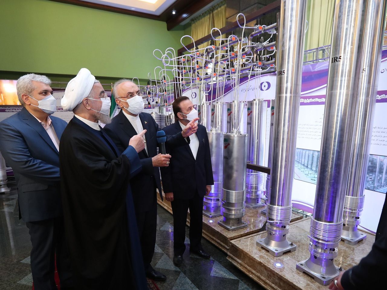 Iranian President Hassan Rouhani visits an exhibition of nuclear achievement on Iran Nuclear Technology Day, Tehran, Iran, April 10, 2021. (Shutterstock)