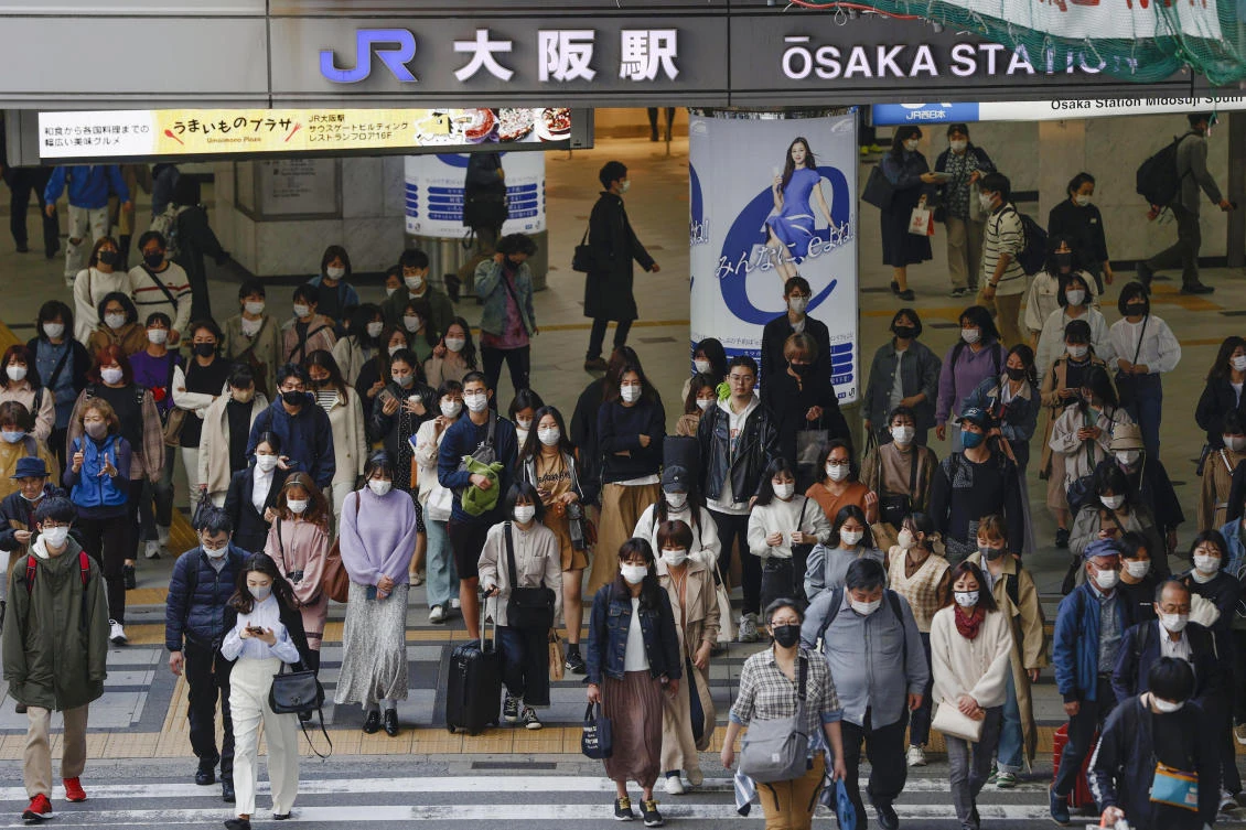 Osaka emerged early from the state of emergency, but then experienced a sharp rebound in coronavirus cases toward the end of March. (Kyodo News via AP)