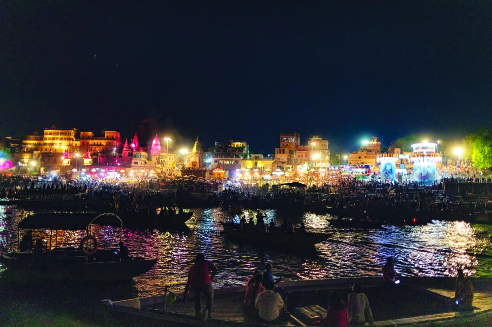 Evening rituals are performed on the banks of the Ganges River in Varanasi, India on Sunday. Millions of Hindu pilgrims gather annually here for ritual bathing and prayers. (AP)