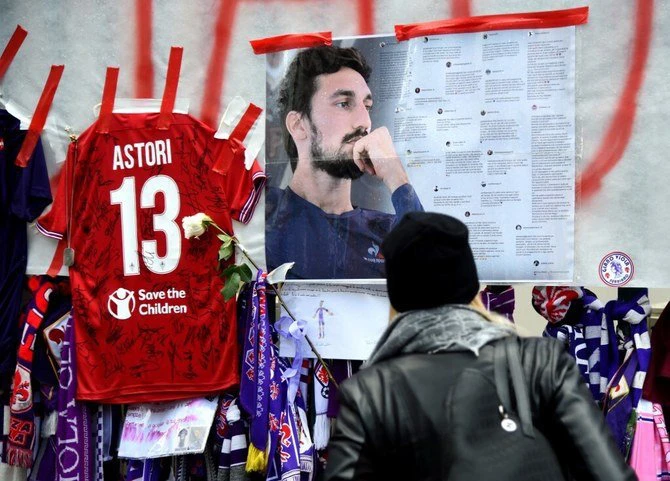 Fans hang tributes to late Fiorentina football team captain Davide Astori while Friday prosecutors requested a doctor receive an 18-month jail term over manslaughter following player’s death. (AFP/File Photo)