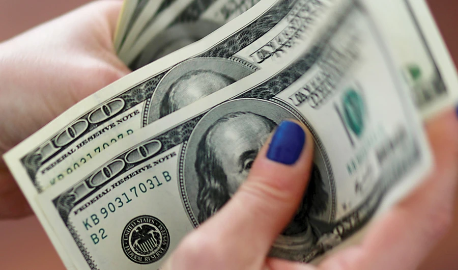 The dollar’s ascent to multi-month highs is likely to continue as more investors bet on economic recovery. (Reuters)
