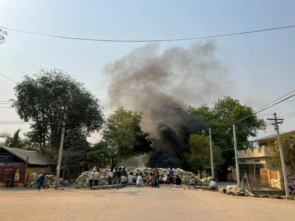Protesters gather behind a barricade during a protest against the military coup, in Monywa, Myanmar, on April 3, 2021. (Photo supplied via Reuters)