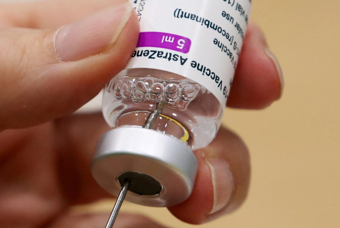 A medical worker prepares a dose of Oxford/AstraZeneca's COVID-19 vaccine at a vaccination centre in Antwerp, Belgium. (File/Reuters)