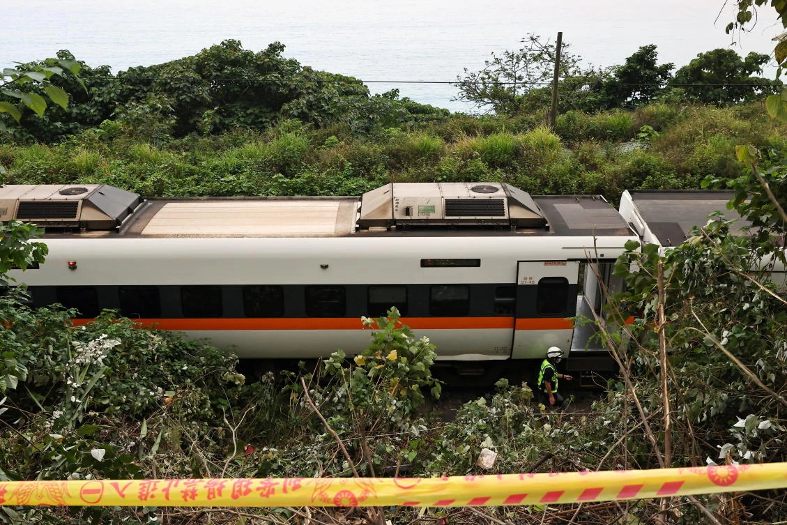 A cordon is seen in front of the train that derailed in a tunnel north of Hualien, Taiwan April 2, 2021. (Reuters)
