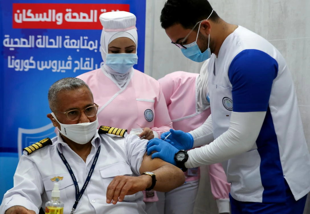 A Suez Canal captains get a coronavirus vaccine. Concerns over the global pace of vaccinations has hit oil prices recently. (Reuters)