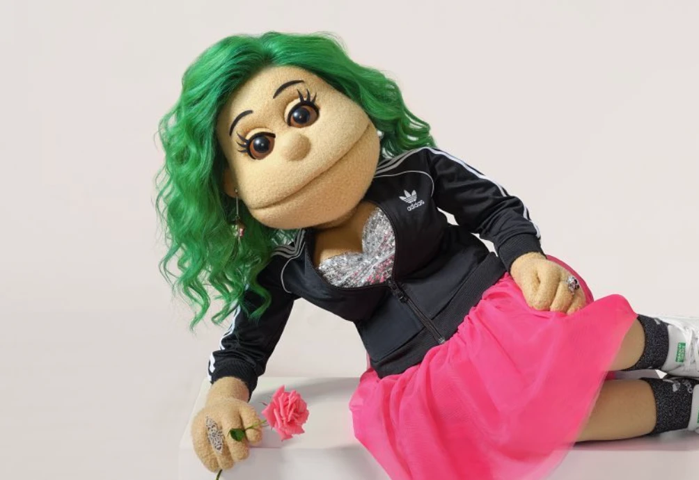 Egyptian puppet Abla Fahita poses for sportswear giant Adidas