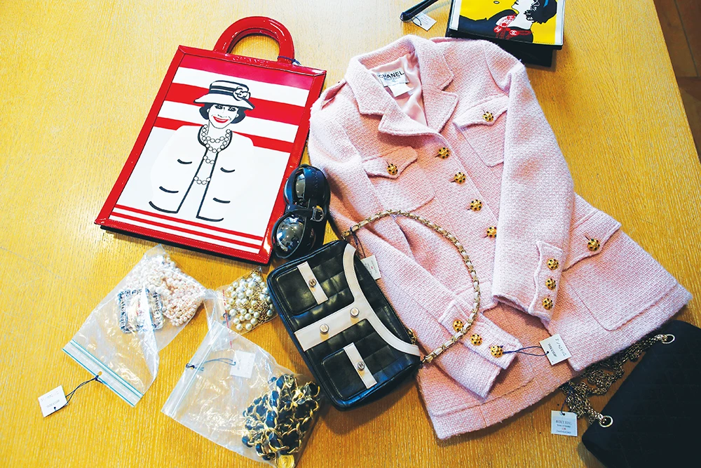 Chanel vintage outfits and accessories are pictured at the Artcurial auction house in Paris. (Reuters)