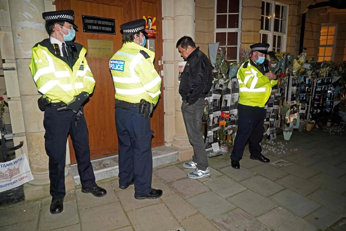 Myanmar’s envoy to the United Kingdom Kyaw Zwar Minn is locked outside the Myanmar Embassy in London on April 7, 2021. (AFP)