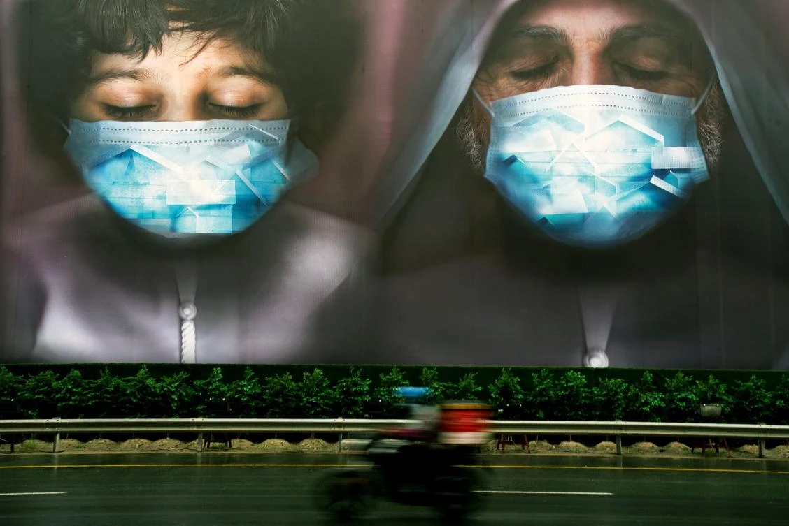 A billboard urges people to stay home during the coronavirus pandemic in Dubai. (AP)