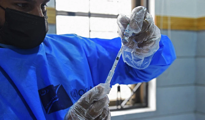 Vaccines sell out in Pakistan as the private market opens, raising concerns of inequality