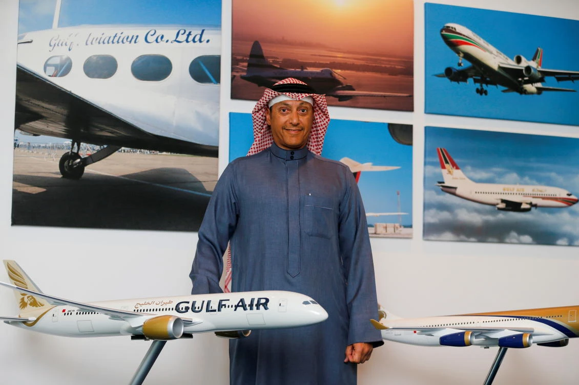 Acting CEO of Gulf Air, Captain Waleed Abdulhameed Al-Alawi poses for photos during an interview at the company's headquarters in Bahrain. (Reuters)