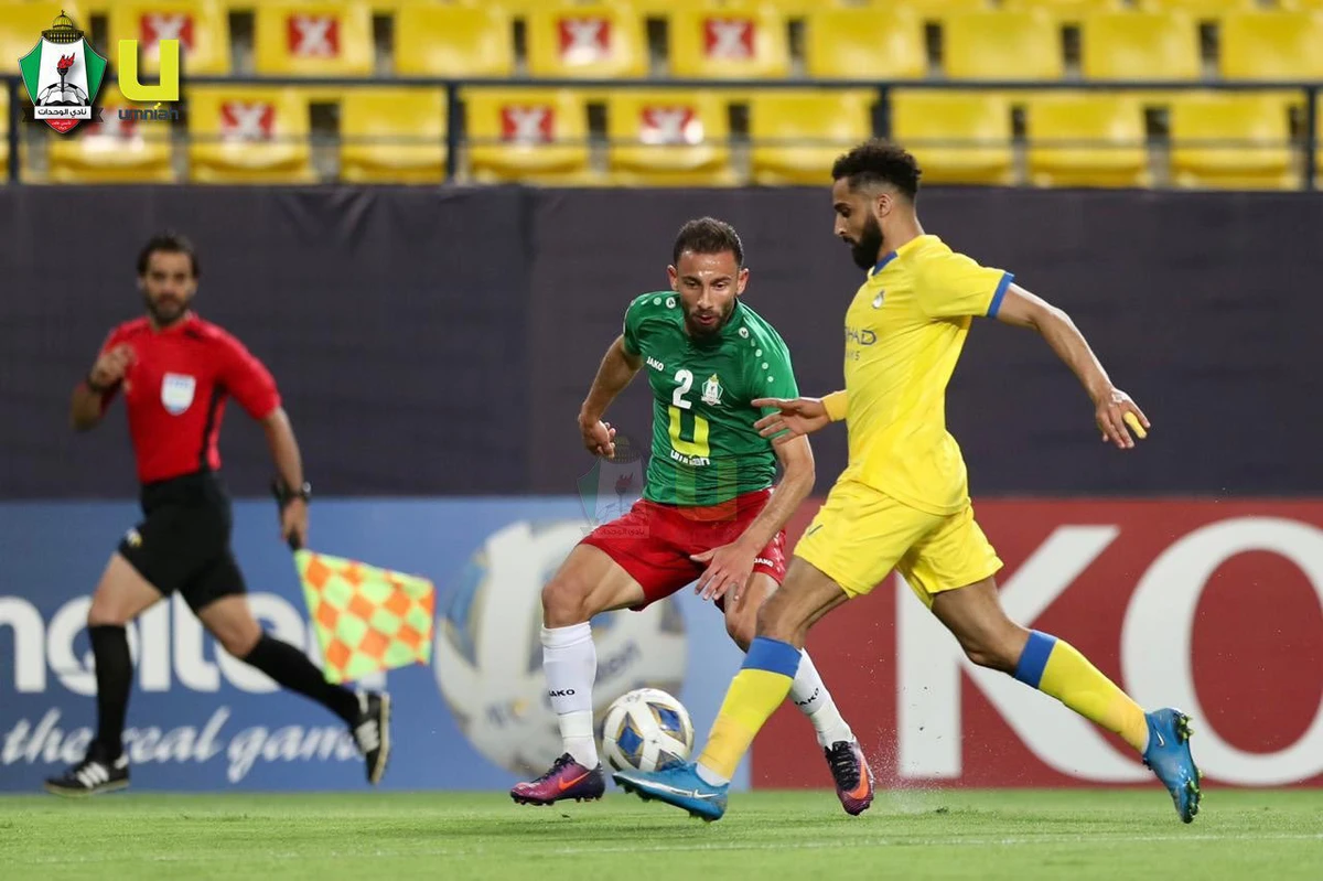 Jordan’s Al-Wehdat team (green shirts) face off with Saudi Arabia's Al-Nassr team on Wednesday. (Al-Wehdat via Twitter)