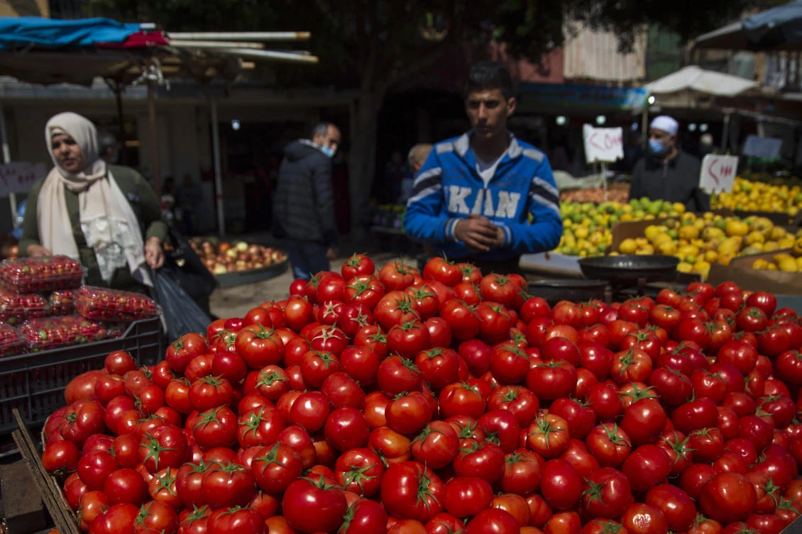 A vendor displays vegetables in preparation for Ramadan at a market in Beirut. (AP)