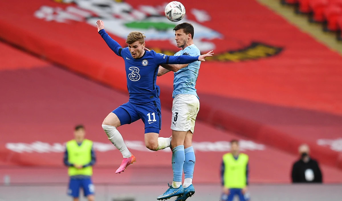 Chelsea’s striker Timo Werner and Manchester City’s defender Ruben Dias compete during Saturday’s match. (AFP)