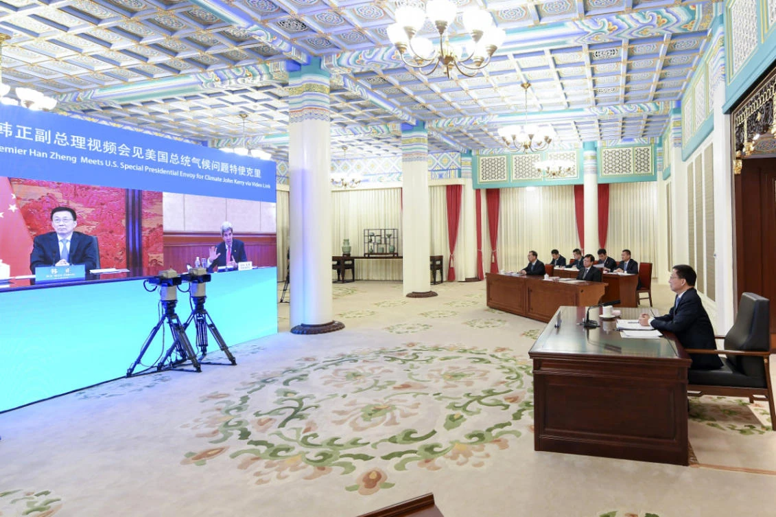Chinese Vice Premier Han Zheng, right, meets with US climate envoy John Kerry via video link in Beijing, on April 16, 2021. (Zhang Ling/Xinhua via AP)