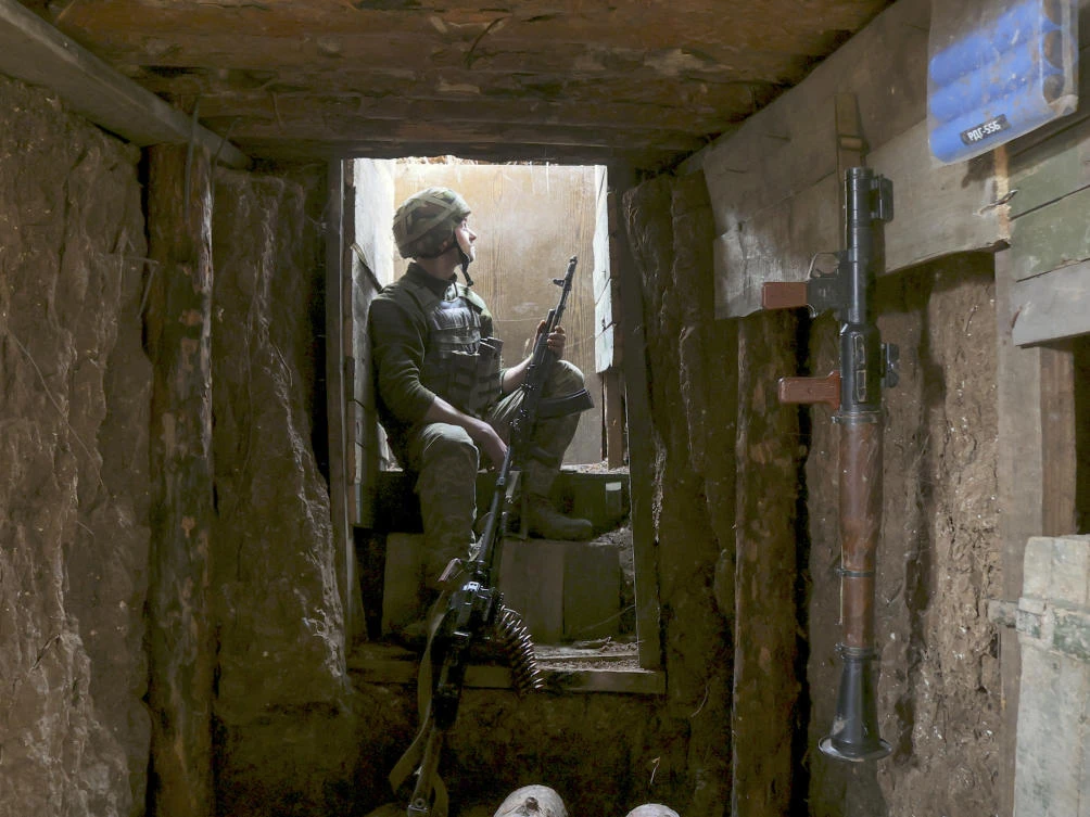 A Ukrainian soldier is seen at fighting positions on the line of separation from pro-Russian rebels near Donetsk, Ukraine, Monday, April 19, 2021. (AP)