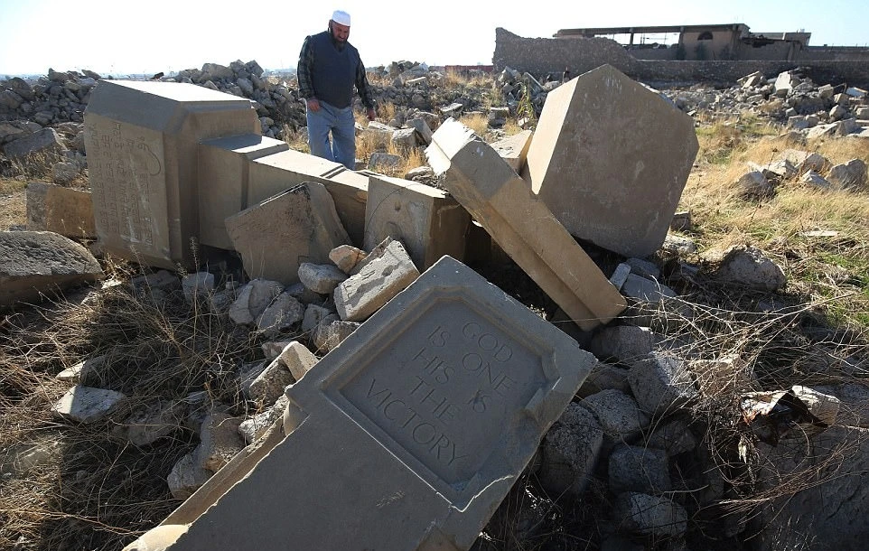 Destroyed memorial columns at Mosul War Cemetery, a mile west of the Old City. Hundreds of Commonwealth soldiers who died in the the First and Second World Wars are buried in the cemetery. (AFP)