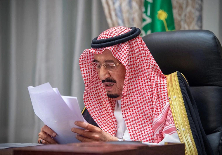 A handout picture provided by the Saudi Royal Palace on November 12, 2020, shows Saudi King Salman bin Abdulaziz Al-Saud delivering a speech to the Shura council in the capital Riyadh. (AFP)