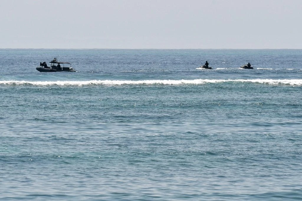 Search intensifies for missing Indonesian submarine after oil spill detected