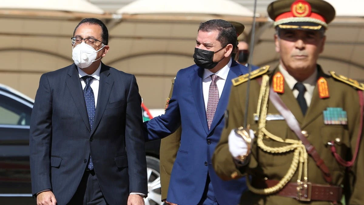 Libya’s Prime Minister Abdel-Hamid Al-Dabaiba, right, welcomes his Egyptian counterpart Mustafa Madbouly, Tripoli, Libya, April 20, 2021. (Reuters)
