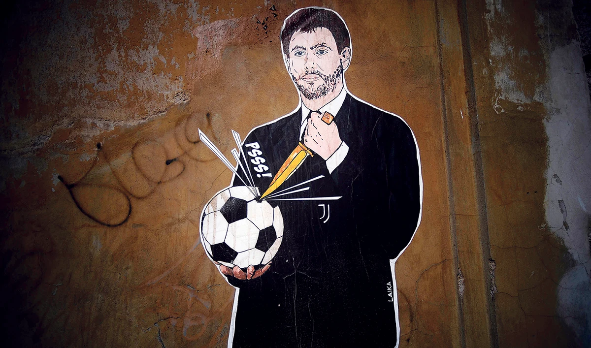 Photo shows a grafiti entitled “The failed coup” (Il Golpe Fallito) by Italian artist Laika, showing Juventus President Andrea Agnelli puncturing a football, near the headquarters of the Italian Football Federation in Rome on Wednesday. (AFP)