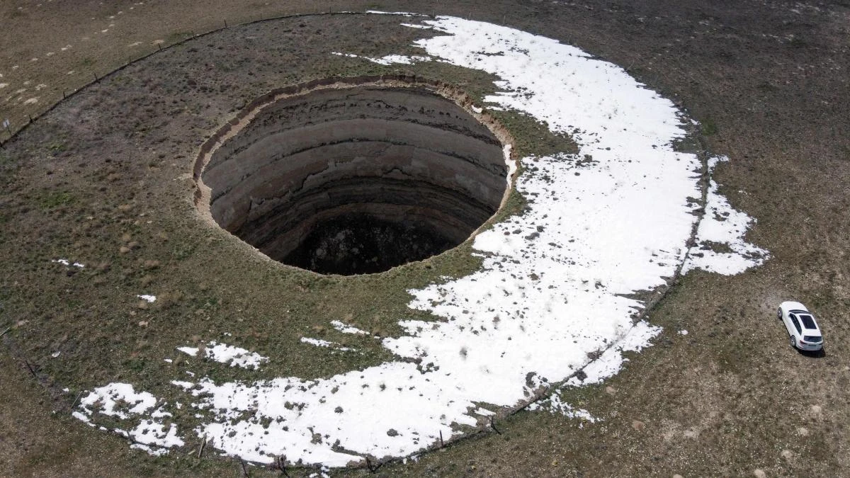 An aerial view of a sinkhole in Konya. Sinkholes dot the drought-stricken breadbasket of the Turkish plains, worrying farmers as they multiply. (AFP)