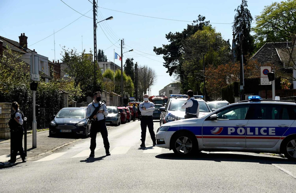 Attacker fatally stabs police employee near Paris, Macron calls it terrorism