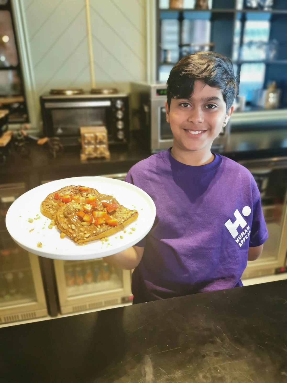 ‘I wanted to give back’: Fasting 10 year old British Muslim cooks for the poor during Ramadan
