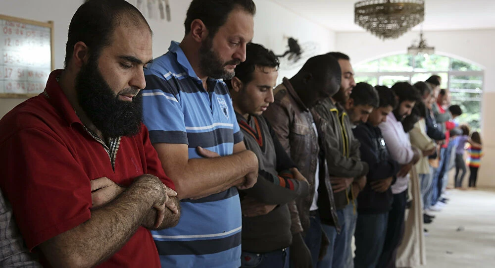 Syrian refugee Abdulhannan Mouhammed, second from left, attends Friday prayer at a mosque in Sao Paulo in 2015. (AP/File Photo)