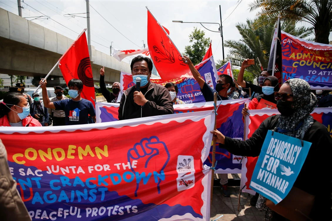Activists hold placards and banners during a protest to support the anti-coup movement and democracy in Myanmar ahead of the ASEAN leaders’ meeting in Jakarta, Indonesia on April 24, 2021. (Reuters)