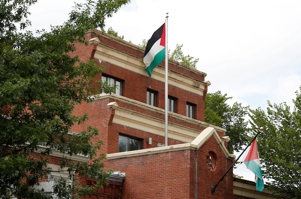 Flags fly over the Palestine Liberation Organization (PLO) office in Washington, September 12, 2018. (Reuters)