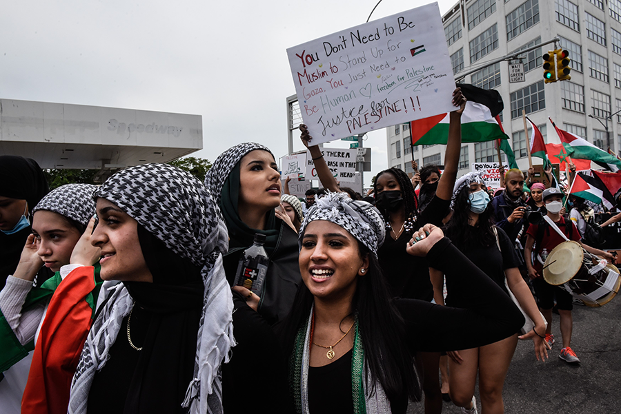 People participate in a pro-Palestinian rally on May 22, 2021 in the Queens borough of New York City. (AFP)