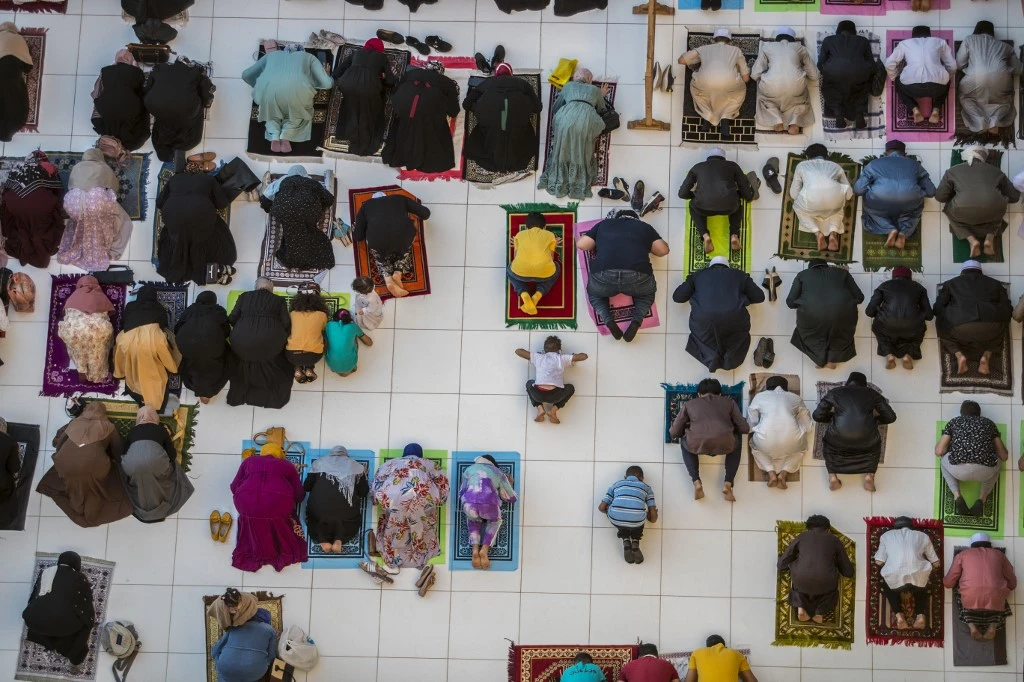 Muslims attend Eid Al-Fitr prayer at Al-Azhar mosque in the Egyptian capital Cairo on May 13, 2021. (AFP)