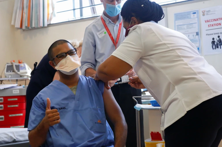 A healthcare worker receives the Johnson & Johnson vaccine at Khayelitsha hospital in Cape Town, South Africa. (Reuters)