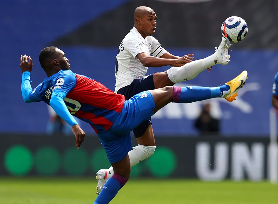Manchester City’s Fernandinho and Crystal Palace’s Christian Benteke battle for the ball during Saturday’s Premier League match in London. (AP)