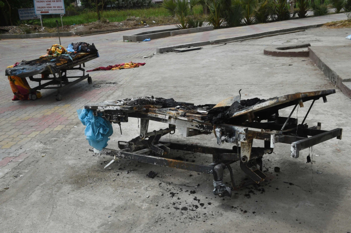 Hospital fire kills 18 virus patients as India steps up jabs