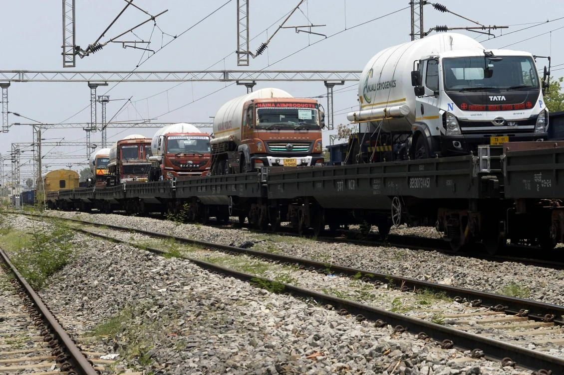 Oxygen tankers are seen on a special train 'Oxygen Express' upon their arrival at a station amidst rising Covid-19 coronavirus cases, in Hyderabad on May 2, 2021. (AFP)