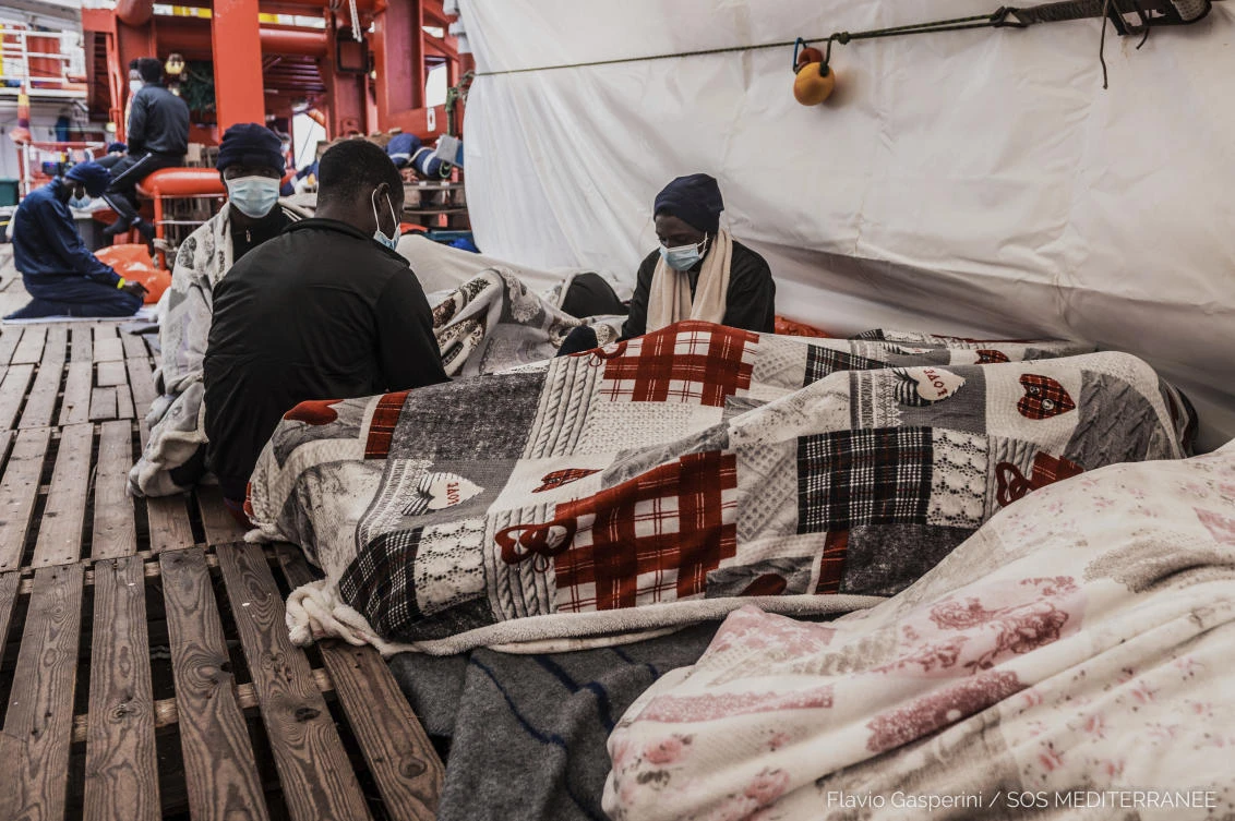 In this photo taken Friday, April 30, 2021 migrants rest aboard of the Ocean Viking during its navigation in the Mediterranean Sea. (Flavio Gasperini/SOS Mediterranee via AP)