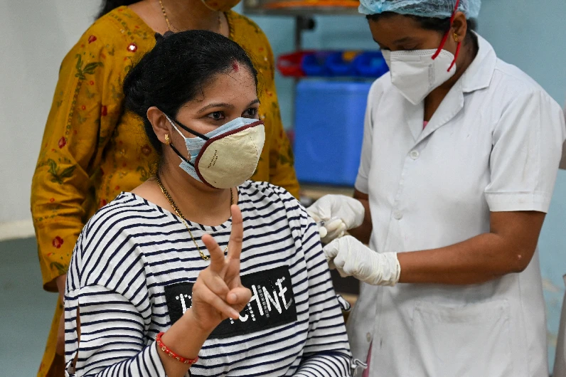 India opens vaccination to all adults amid surge