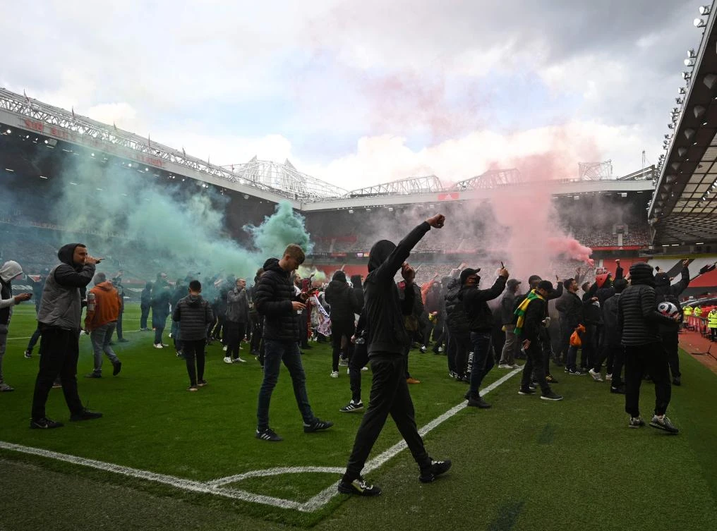 Supporters protest against Manchester United's owners at Old Trafford stadium ahead of a match against Liverpool. (AFP)