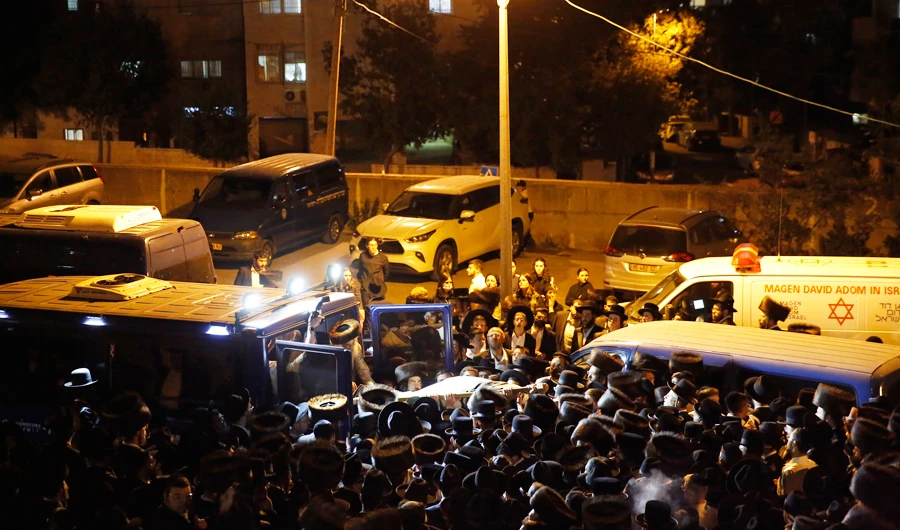 Mourners gather for the funeral of Eliyahu Cohen, who died during Lag BaOmer celebrations at Mt. Meron in northern Israel, in Jerusalem on Saturday, May 1 2021. (AP)