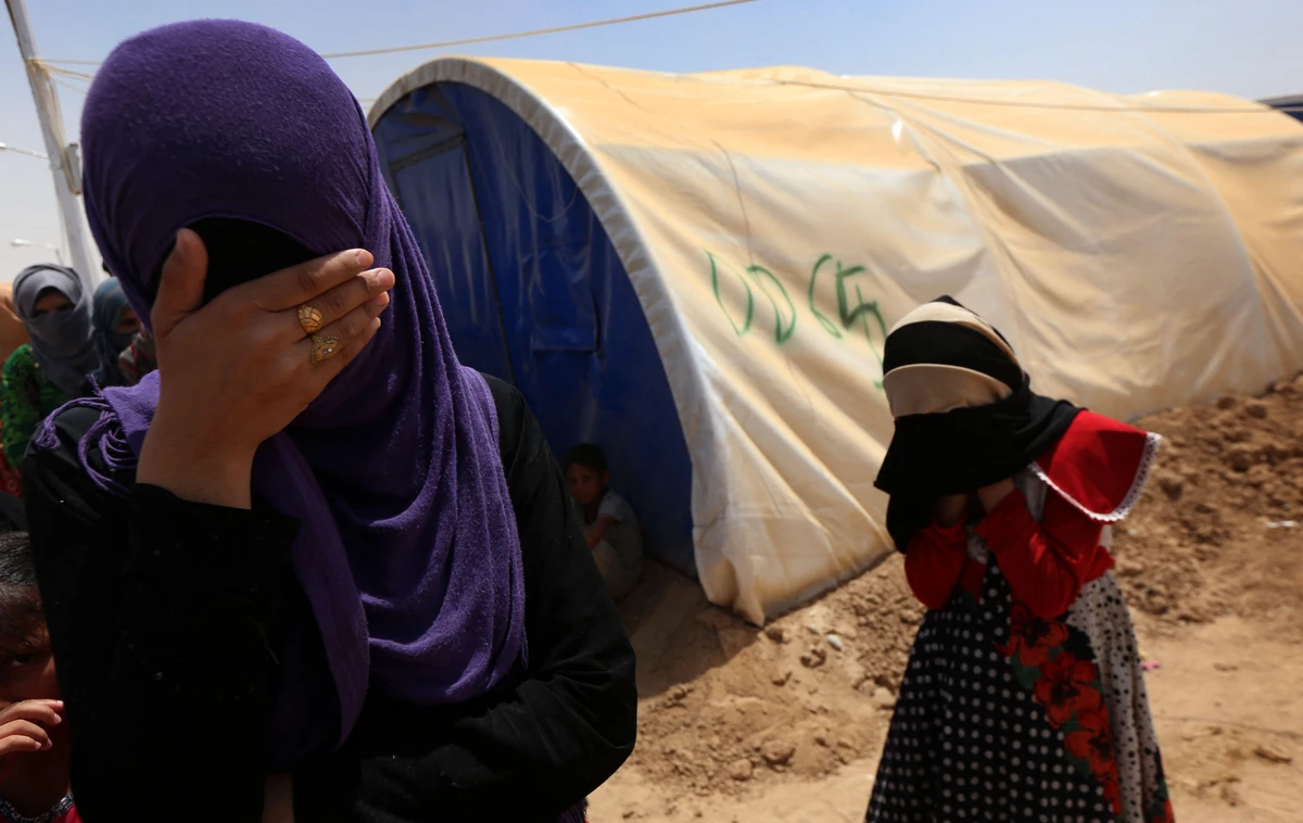 An unwritten policy of guilt by association with Daesh has left thousands of Iraqi households in a state of limbo — unable to move forward or back. (AFP/File Photo)