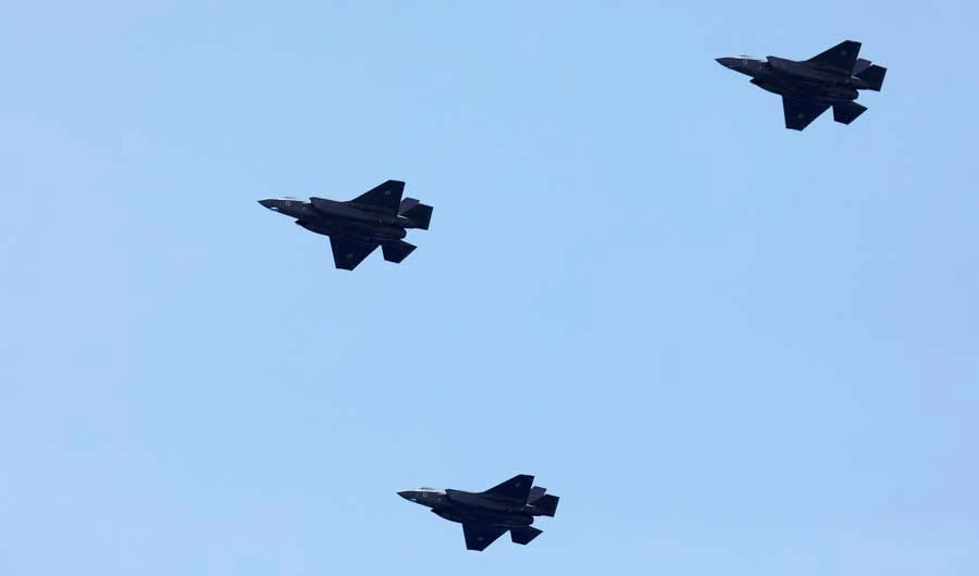 Israeli Air Force F-35 fighter jets fly over the Mediterranean Sea during an aerial show in Tel Aviv, Israel. (REUTERS)