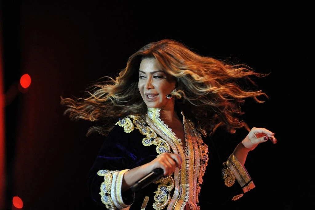 Lebanese pop star Nawal Al-Zoghbi tweeted her resignation from Artists’ Syndicate after body’s request to avoid criticizing politicians. Furious diva insisted Lebanese should express themselves freely and democratically. (AFP)